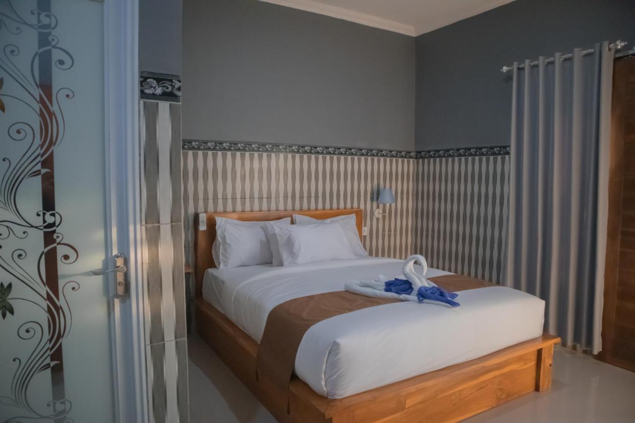 Prasi Sunrise Homestay Toyapakeh ภายนอก รูปภาพ