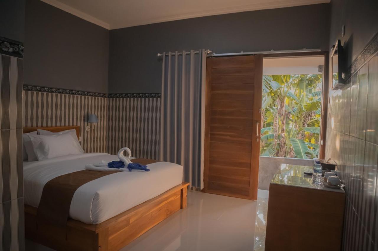 Prasi Sunrise Homestay Toyapakeh ภายนอก รูปภาพ