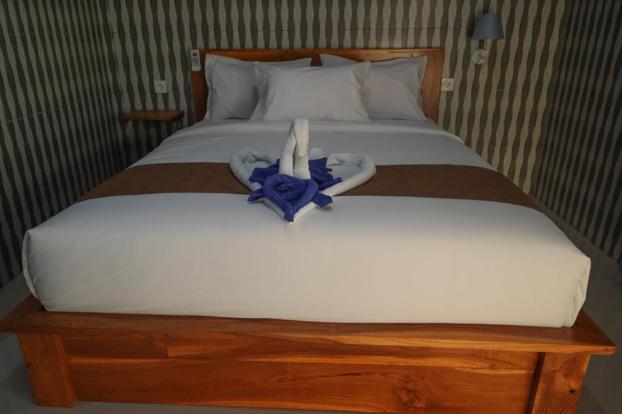 Prasi Sunrise Homestay Toyapakeh ภายนอก รูปภาพ