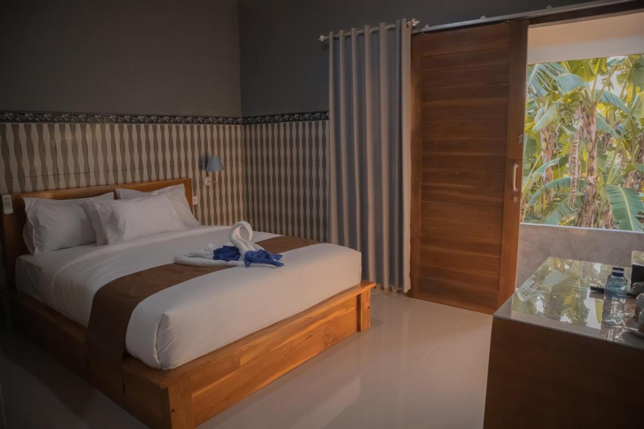 Prasi Sunrise Homestay Toyapakeh ภายนอก รูปภาพ