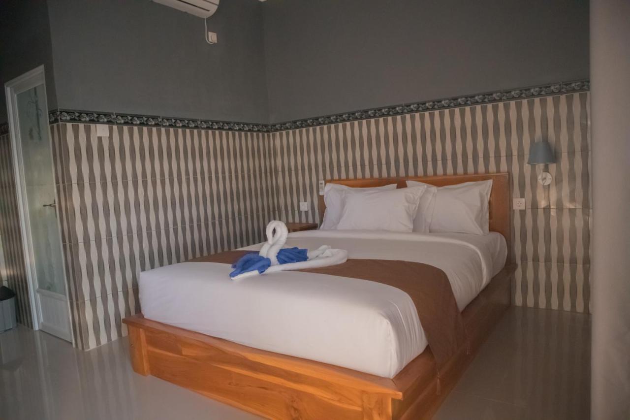 Prasi Sunrise Homestay Toyapakeh ภายนอก รูปภาพ
