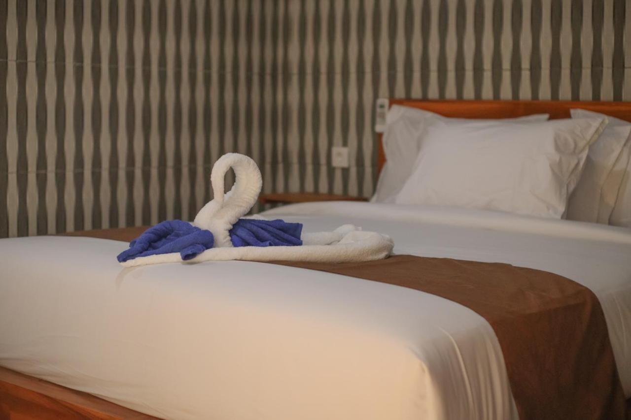 Prasi Sunrise Homestay Toyapakeh ภายนอก รูปภาพ